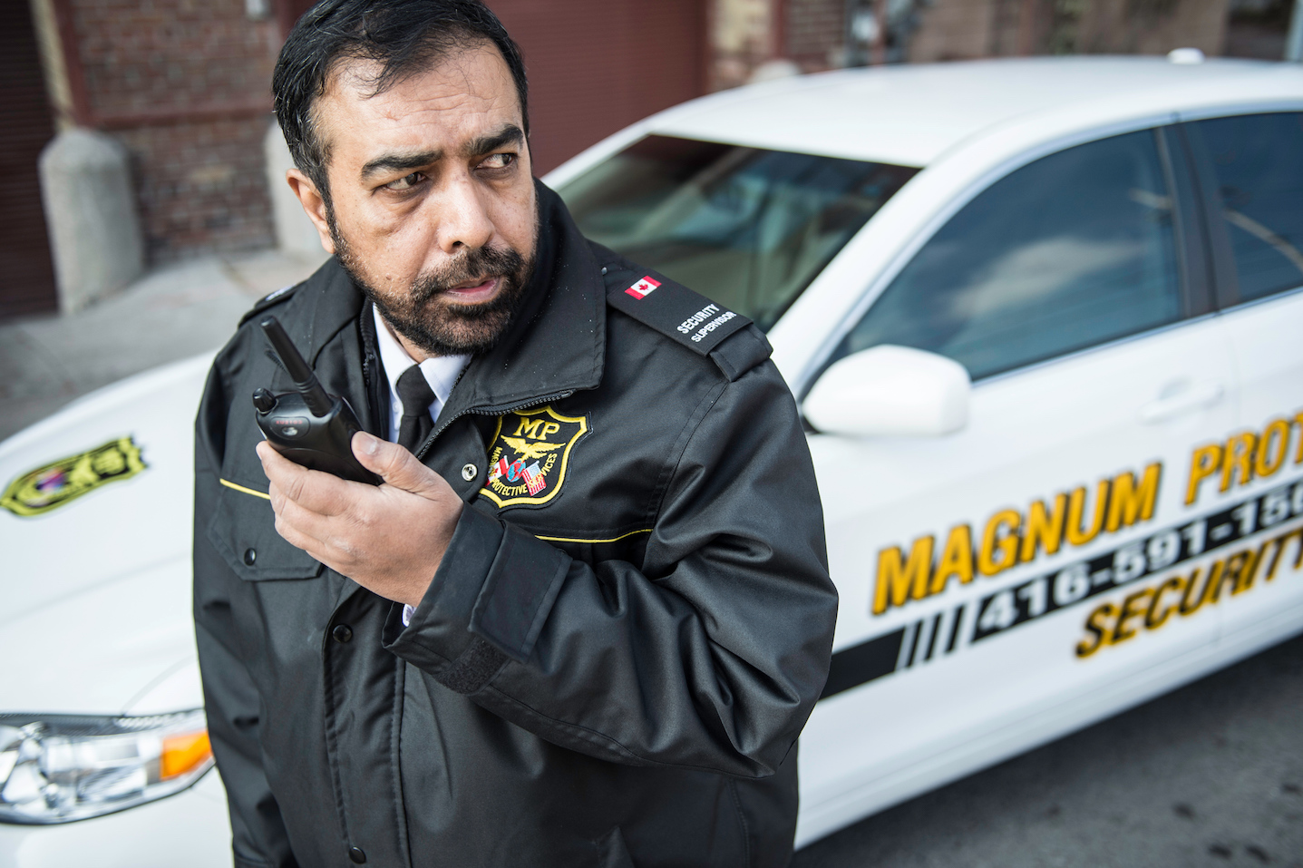 Patrol guard using walkie talkie